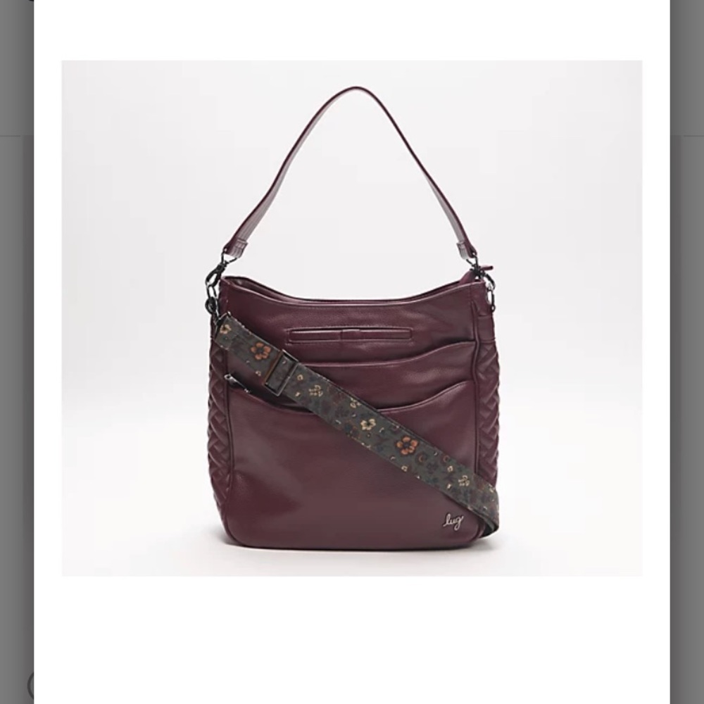 Gorgeous lug purse in a wine color. New with tags!